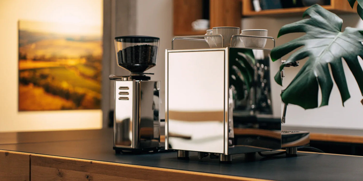 Modern espresso machine and grinder on counter