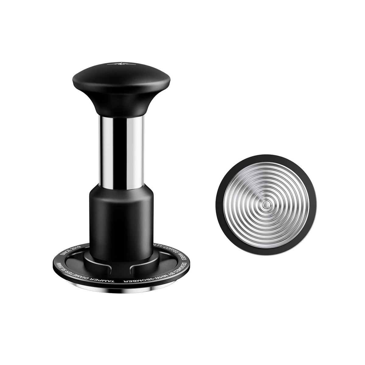 The MHW-3BOMBER Knight Impact Tamper 58.35mm (Black) is shown from the side and bottom, highlighting its 4-spring internal design and textured concentric circle pattern on the base.