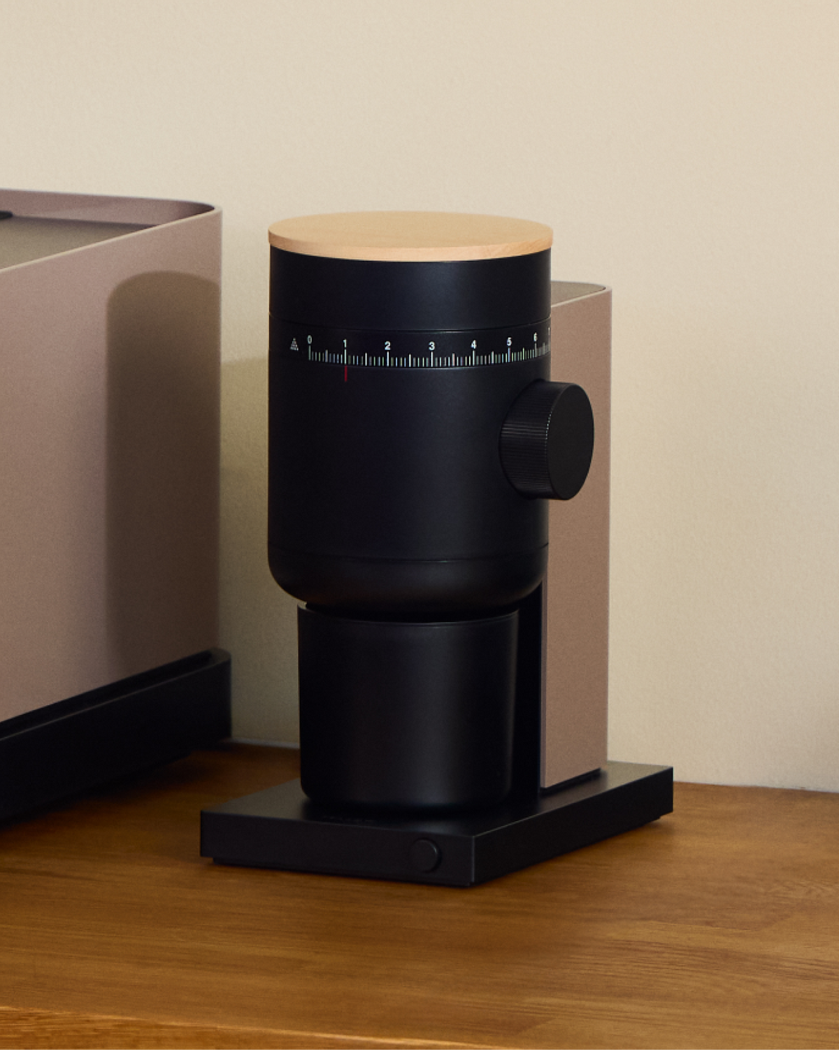 Fellow Opus 2 Conical Burr Grinder in malted chocolate with maple lid, angled view