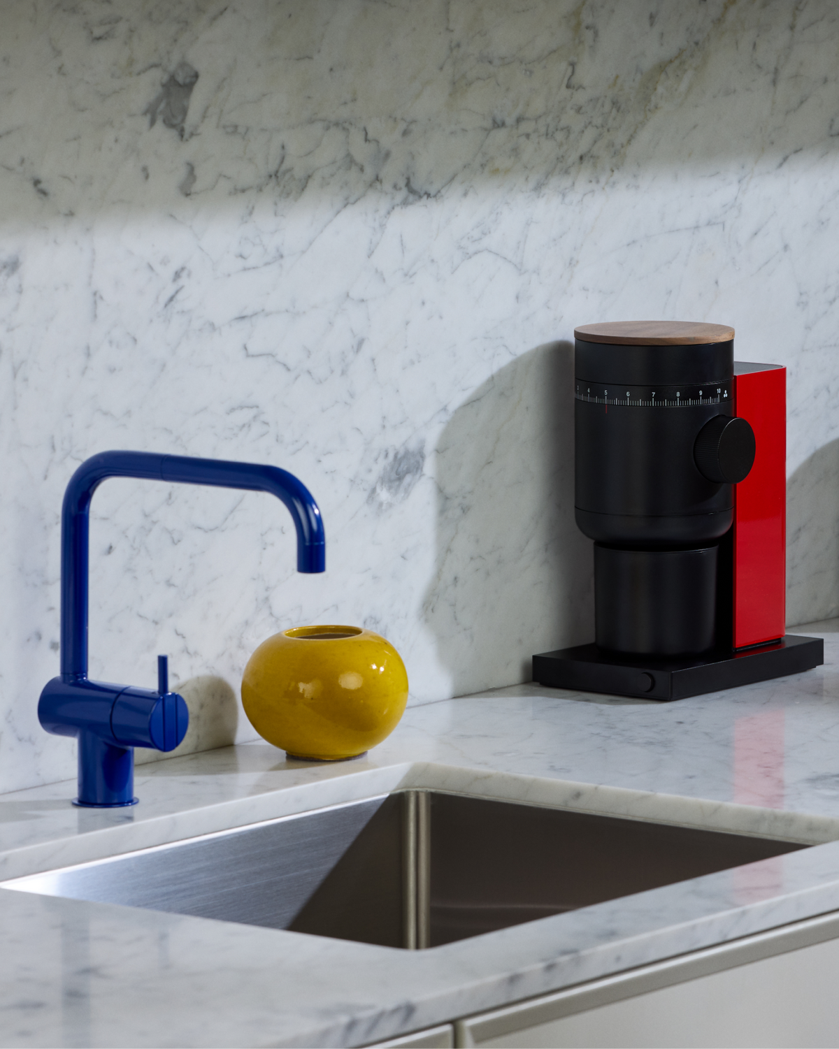 Fellow Opus 2 Conical Burr Grinder in cherry red with walnut lid and catch cups