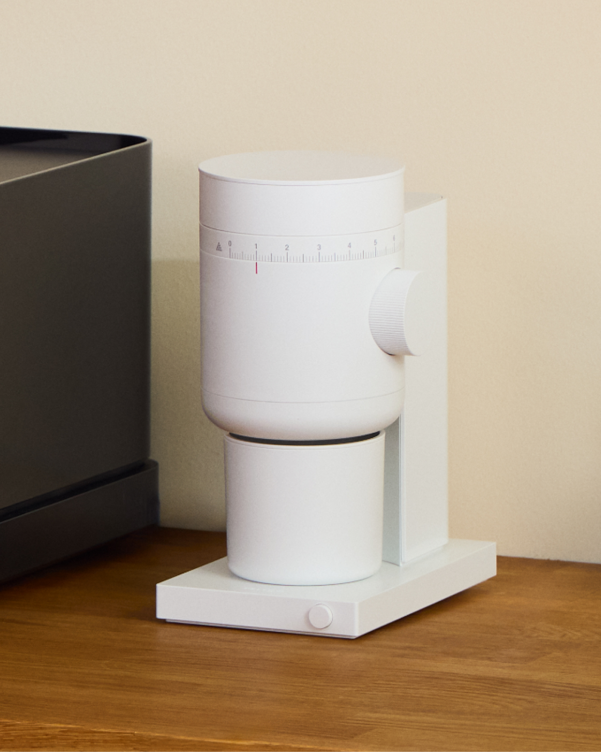 Fellow Opus 2 Conical Burr Grinder in matte white, angled view