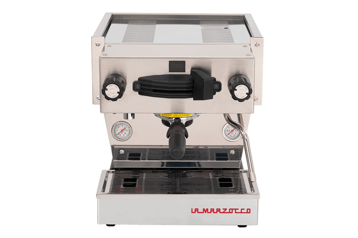 The La Marzocco Linea Mini R Dual Boiler Semi-Automatic Espresso Machine in brushed stainless steel, shown from the front, showcases two dials, a portafilter, a steam wand, and the La Marzocco brand logo at the bottom. Combining commercial-grade performance with a compact design, it’s ideal for passionate home baristas who want to achieve café-quality espresso at home.