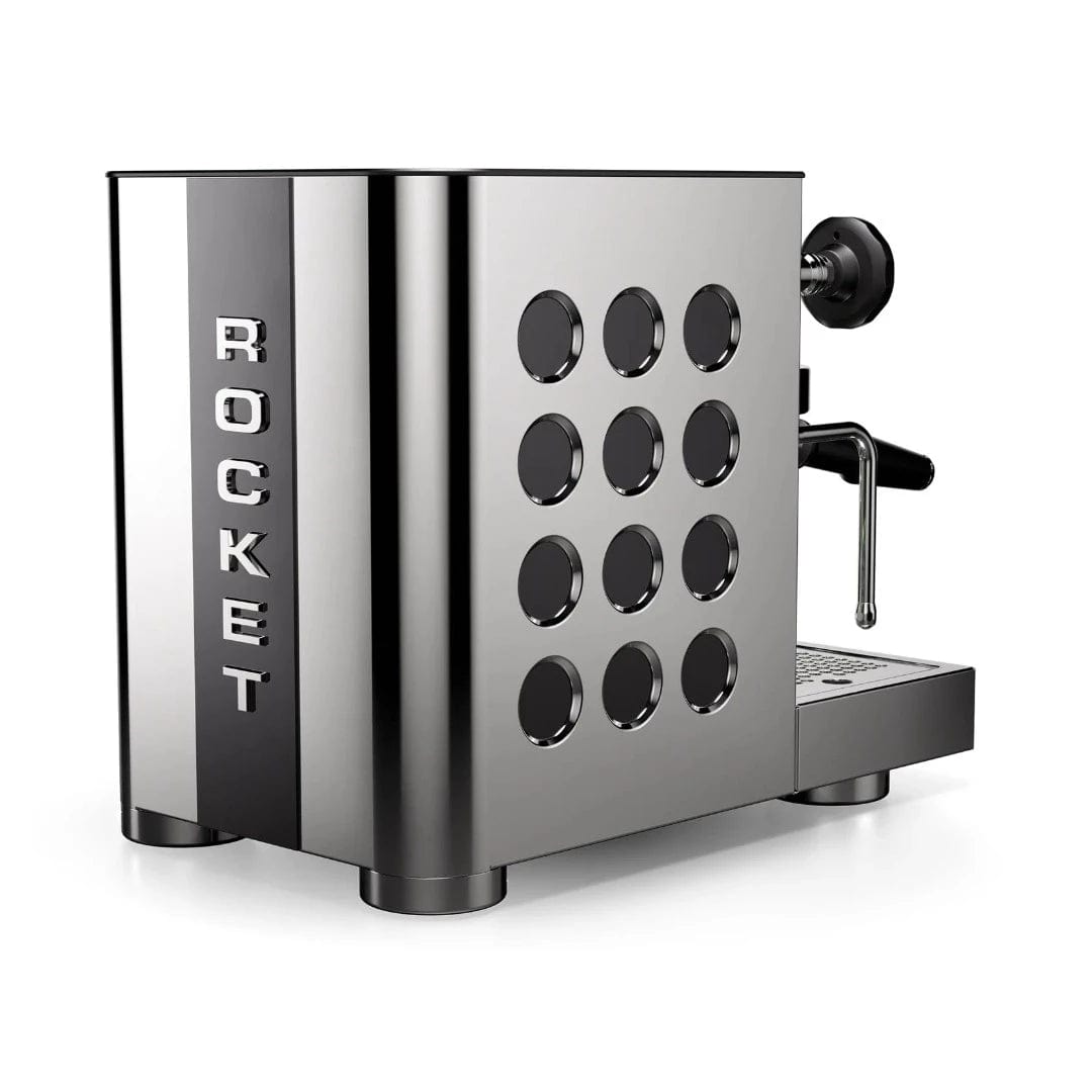 Introducing the Rocket Appartamento TCA, a premium domestic espresso machine with flow control and a sleek stainless steel-black finish. It features precise temperature adjustment, circular side holes, a milk frothing wand, and the iconic "Rocket" brand name displayed vertically.
