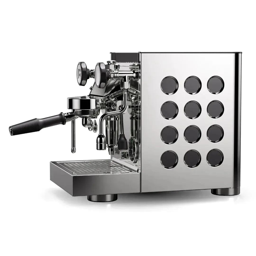The Rocket Appartamento TCA Espresso Machine with Flow Control RE502A3B12 is a stainless steel, black-finished high-end home espresso machine with pressure gauges, a portafilter, circular side cutouts, and precise temperature control for perfect brews on any countertop.