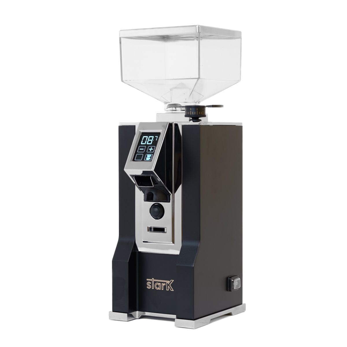A matte black Eureka Oro Mignon Stark grinder with a clear hopper on top, featuring a digital display and control buttons on the front. The brand name "Eureka" is visible at the bottom, and it boasts 65 mm flat burrs along with an ACE Anti-clump system for optimal performance.