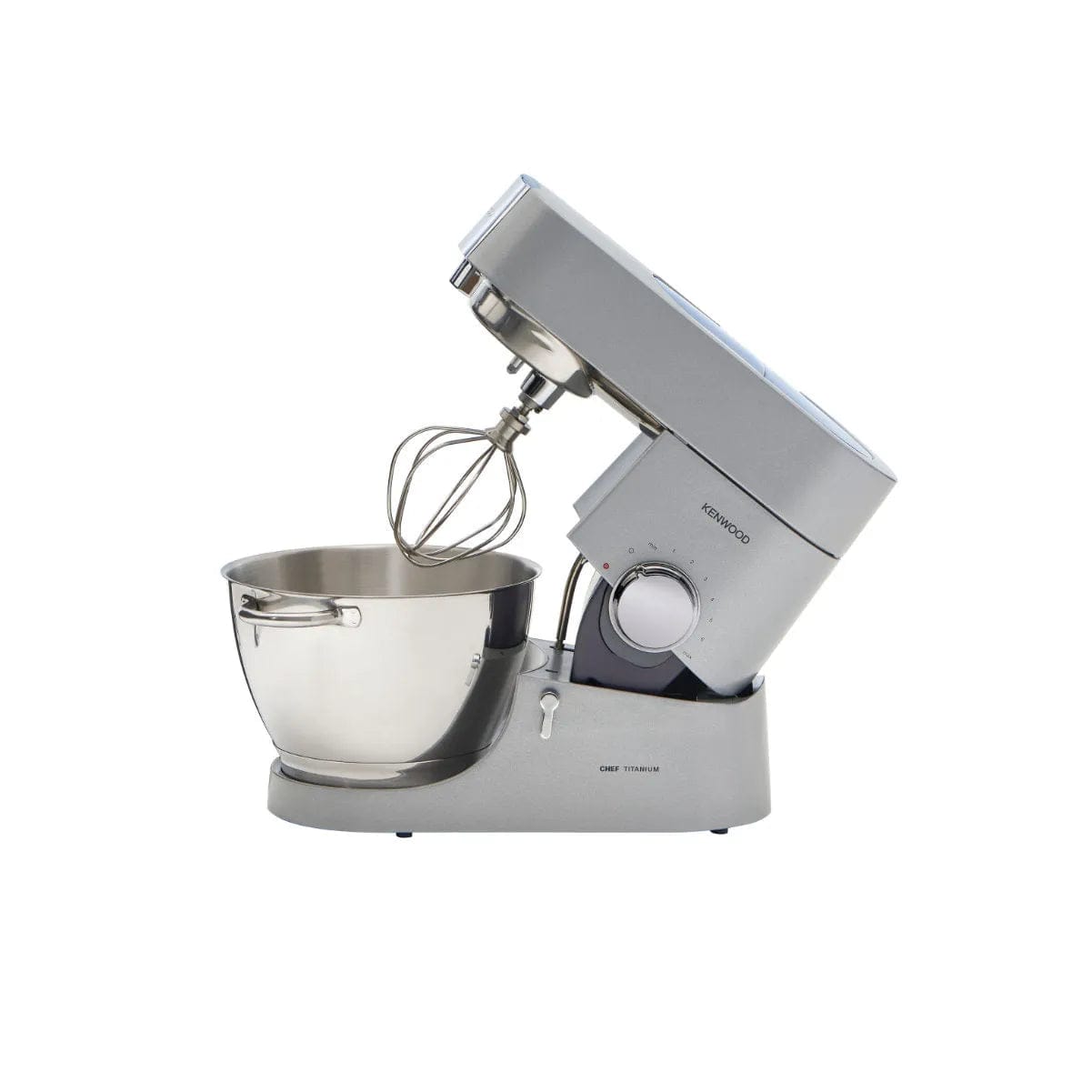 The Kenwood Chef Titanium KMC011 Stand Mixer & Kitchen Machine (4.7L / 5.0QT) features a powerful 720 Watt motor, a stainless steel mixing bowl, and a wire whisk attachment. The sleek silver stainless steel mixer is tilted back to display its mechanism and controls, boasting a modern aesthetic with the Kenwood brand logo prominently on the side and expandable attachments available.