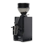 The Eureka Mignon Zero 55s Single Dose Coffee Grinder by Eureka features flat burrs, a transparent bean hopper, a stainless steel grounds container, and "ZERO 55s" on the front—all in a sleek matte black, modern boxy design.