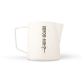 The MHW-3BOMBER Latte Art Trio Bundle features a 500ml white pitcher with a straight handle, spout, and bomber plane graphic—ideal for any MHW-3BOMBER enthusiast.