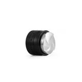 The MHW-3BOMBER Coffee Gravity Distributor 58.35mm, featuring a sleek black body and shiny silver cap with a cyclone-shaped base, rests on a plain white background.