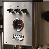 Gaggia Classic UP Semi-Automatic Espresso Machine EG2500/00 in stainless steel, featuring three toggle switches above a circular pressure gauge and a 58 mm portafilter.