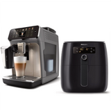 A Philips 5500 EP5544/90 (Grey Chrome) espresso machine brews a latte next to a Philips Digital Airfryer HD9621/96 (Black), both from Philips, elegantly displayed on a white background.
