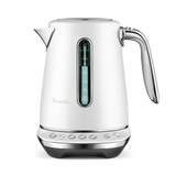 The Breville the Smart Kettle Luxe 1.7L (Sea Salt) is a sleek white kettle with a silver handle and spout, visible water window, and multiple base buttons for temperature settings, shown against a plain white background.