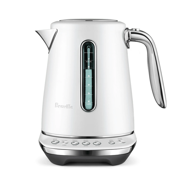 The Breville the Smart Kettle Luxe 1.7L (Sea Salt) is a sleek white kettle with a silver handle and spout, visible water window, and multiple base buttons for temperature settings, shown against a plain white background.