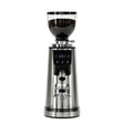 The Bellucci Preciso Mini Coffee Grinder (Stainless Steel) features a digital display, transparent bean hopper, front control buttons, and 64mm flat burrs for precise espresso grinding. "Bellucci" is displayed at the base.