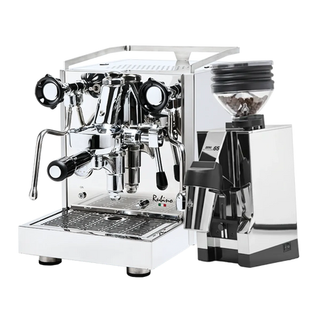 The Quick Mill Rubino Espresso Machine (Stainless Steel) & Eureka Mignon Zero 65 All Purpose Grinder (Chrome) Bundle by Quick Mill is pictured on a white background, with the espresso machine’s dual gauges and the chrome grinder filled with beans, creating the ideal setup for single-dose espresso enthusiasts.