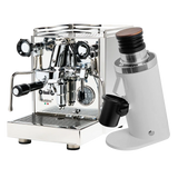 The Quick Mill Rubino Espresso Machine (Stainless Steel) & DF64 Gen 2 Single Dose Coffee Grinder (White) Bundle by Quick Mill is displayed on a clean white background, showcasing the espresso machine’s gleaming gauges and levers next to the modern coffee grinder featuring a black lid and portafilter holder.