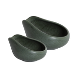 Two matte dark green, oval-shaped ceramic trays from the Loveramics Coffee Dosing Tray Set (Set of 2) are arranged side by side on a white background, echoing the sleek style often featured in James Hoffmann’s coffee gear reviews. With one tray slightly larger than the other, this Loveramics set is ideal for use as coffee dosing trays when preparing your next brew.