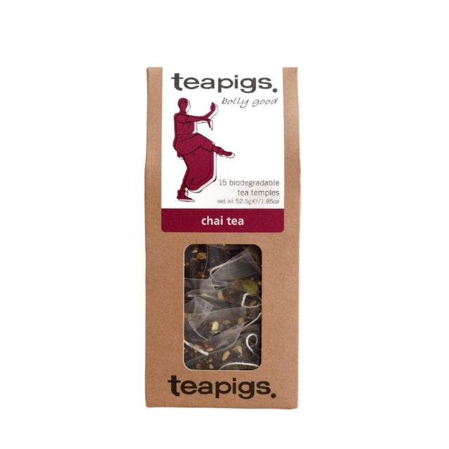 A box of TeaPigs Chai Tea Loose Leaf Tea Sachets, featuring a woman in a dance pose on the label. The label includes text indicating "15 biodegradable tea temples" with a net weight of 52.5g (1.86oz). The window on the package shows the Assam black tea bags inside, promising a deliciously spicy tea experience.