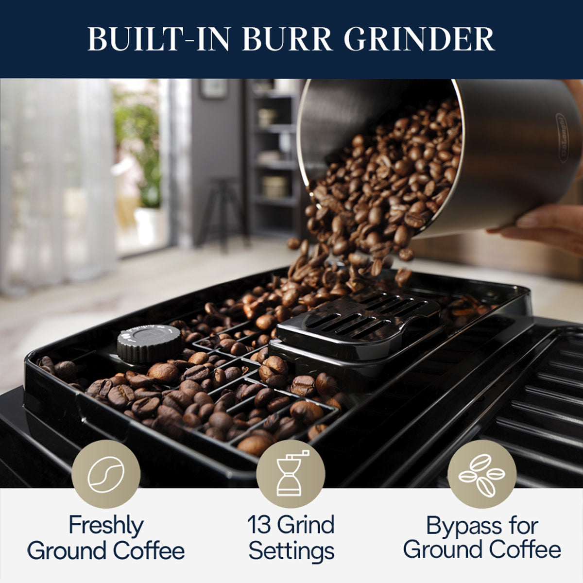 Pouring coffee beans into the built-in conical burr grinder on the DeLonghi Magnifica Start Super Automatic Espresso Machine ECAM22022SB (Silver), with text highlighting features: freshly ground coffee, 13 grind settings, and a bypass for pre-ground coffee.