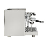 A side view of the ECM Technika VI Dual Boiler Espresso Machine with PID temperature control, stainless steel body, portafilter handle, and multiple knobs, by ECM, standing on a flat metal drip tray.