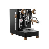 The Lelit Mara X3 Semi-Automatic Heat-Exchange Espresso Machine PL62X3 (Black) by Lelit features black and silver finishes with wooden handles and knobs, electronic flow control, a pressure gauge, and a cup tray, shown on a white background.