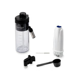 Accessory set for DeLonghi Magnifica Evo (ECAM29084SB) includes a transparent milk container with black lid and spout, water filter, cup attachment, measuring scoop, and test strip—perfect for your espresso machine with LatteCrema System.
