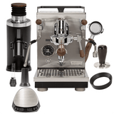 The Profitec Jump Espresso Machine & DF64 Grinder "Ready To" Bundle combines style and precision, featuring a black machine, Red Speed Titanium burr grinder, WDT tool, brown wood bottomless portafilter, scale, and dosing funnel.