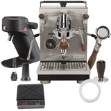 The Profitec Jump Espresso Machine & MAHLKÖNIG X64SD Grinder bundle includes a WDT tool, brown wood bottomless portafilter, scale, and dosing funnel—everything you need for premium espresso at home.