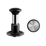 The MHW-3BOMBER Knight Impact Tamper 58.35mm (Black) is shown from the side and bottom, highlighting its 4-spring internal design and textured concentric circle pattern on the base.
