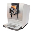 A Jura Z10 Aluminum White Super Automatic Hot Coffee & Espresso, Cold Brew, & Specialty Beverage Machine (model 15361) from Jura dispenses a cup of coffee, with a small glass of espresso positioned on its central shelf beneath the dual spouts—enhanced by its innovative Product Recognizing Grinder for the perfect brew every time.