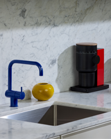 Fellow Opus 2 Conical Burr Grinder in cherry red with walnut lid and catch cups