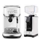 A sleek Breville The Bambino Plus Espresso Machine BES500SST in Sea Salt and a white Eureka Facile Grinder sit side by side, both set against a plain white background.