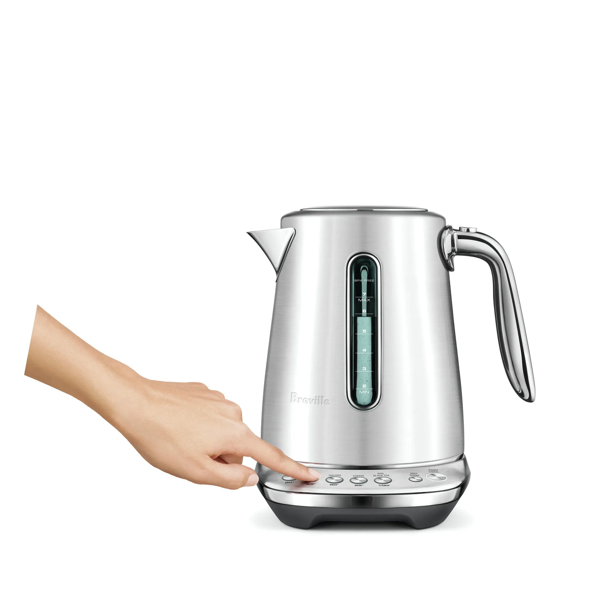 A hand presses a button on the Breville the Smart Kettle Luxe 1.7L BKE845BSS, a brushed stainless steel kettle with variable temperature control and water level window, set against a plain white background.