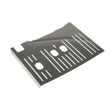 The DeLonghi Drip Tray Cover (6013214711) is a metallic, rectangular part with rectangular and oval cutouts and raised edges on two sides, designed for appliances like the Dinamica or Dinamica Plus.