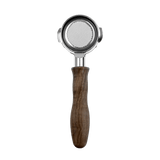 The HCS Bottomless Portafilter (Brown Wood) by HCS features a round mesh filter and a wooden handle, displayed against a black background.