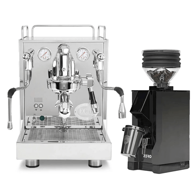 The ECM Mechanika Max Espresso Machine with dual steam wands sits next to the black Eureka Zero Grinder (black spout) in this ECM bundle, featuring dials, a portafilter, clear bean hopper, and grounds catcher.