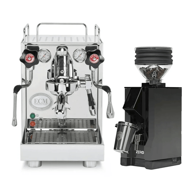 The ECM Mechanika VI Slim Espresso Machine and Eureka Mignon Zero Grinder (Black with Black Spout) bundle from ECM is displayed against a white background, featuring dual gauges and a sleek grinder filled with coffee beans.