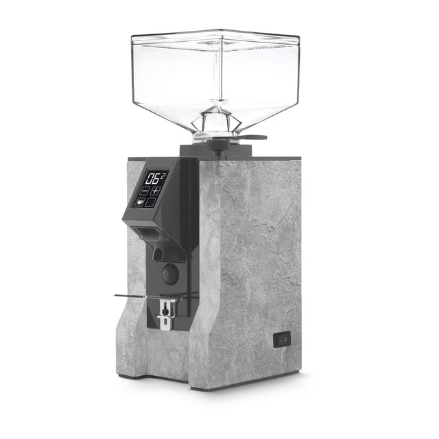 The Eureka Mignon Design Coffee Grinder (Stone) by Eureka features a gray, stone-textured body, transparent square hopper, digital display, and portafilter holder. This Italian grinder stands out against a white background.
