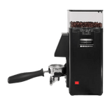 Side view of the Rancilio Stile SD Espresso Coffee Grinder (Black) by Rancilio, featuring flat burrs, a clear hopper filled with coffee beans, and a portafilter attached to collect ground coffee.