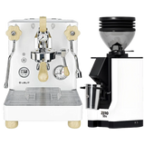 A Lelit Bianca 3 PL162TCW Espresso Machine in white, featuring wooden accents, is paired with a matching Eureka Mignon Zero 55s Single Dose Coffee Grinder (White); both from Lelit are displayed together against a plain light background.