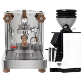 A Lelit Bianca 3 PL162T Espresso Machine with sleek stainless steel construction and refined wooden handles is displayed alongside a white Eureka Mignon Zero 55s Single Dose Coffee Grinder, both from Lelit and featured together as a bundle against a simple background.