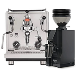 A Profitec Drive Espresso Machine bundled with the Eureka Mignon Zero 55s Single Dose Coffee Grinder in matte black is showcased on a pristine white background. The stainless steel espresso machine boasts PID temperature control and an iconic E61 group head with dials and wands, while the grinder sits beside it, filled with coffee beans.