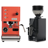 The Profitec Go (Red) Espresso Machine & Eureka Mignon Zero 55s Single Dose Coffee Grinder (Matte Black) Bundle by Profitec is displayed on a white background, with the red espresso machine featuring silver knobs next to the matte black grinder filled with coffee beans.