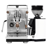 The Profitec Jump Espresso Machine, featuring a stainless steel heat exchanger and stylish wooden handles, is paired with the modern Eureka Mignon Zero 55s Single Dose Coffee Grinder in white. Both sit elegantly on a white background, while the machine’s multifunction switch streamlines espresso extraction for consistently perfect results.