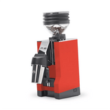 The Eureka Mignon Zero 65 All Purpose Grinder (Red) by Eureka is shown with a transparent bean hopper, stainless steel grind dispenser, and black base, set against a plain white background. Currently backordered.