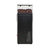 The Rancilio Stile SD Espresso Coffee Grinder (Black) by Rancilio is shown with a transparent hopper filled with coffee beans against a plain background.