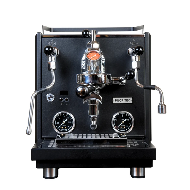 A black Profitec Drive Dual Boiler Espresso Machine with E61 group head, PID temperature control, and flow control is pictured on a white background, featuring pressure gauges, steam and hot water wands, and a portafilter.