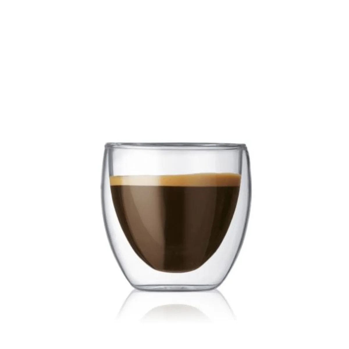 A Bodum Pavina Small 2.5oz Double Walled Coffee & Espresso Glass from a set of 2, filled with dark brown espresso topped with a layer of light-brown crema, isolated against a white background.