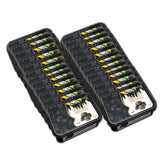 Image shows multiple packs of fresh dates arranged in two neat stacks. The black packaging features a label with yellow and green accents, displaying the name "Royal Palm" along with an image of Royal Palm Al Madina Ajwa premium quality dates and a palm tree. These dates are rich in fiber and potassium for your health.