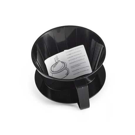 The Technivorm Moccamaster Cup-One Brew Basket 13265 by Moccamaster is a black, BPA-free plastic coffee dripper with a handle. Inside, it includes a piece of paper containing printed instructions and an illustration for assembly or use. The dripper features a fluted design on a flat, circular base, akin to the replacement brew basket for Technivorm Moccamaster.